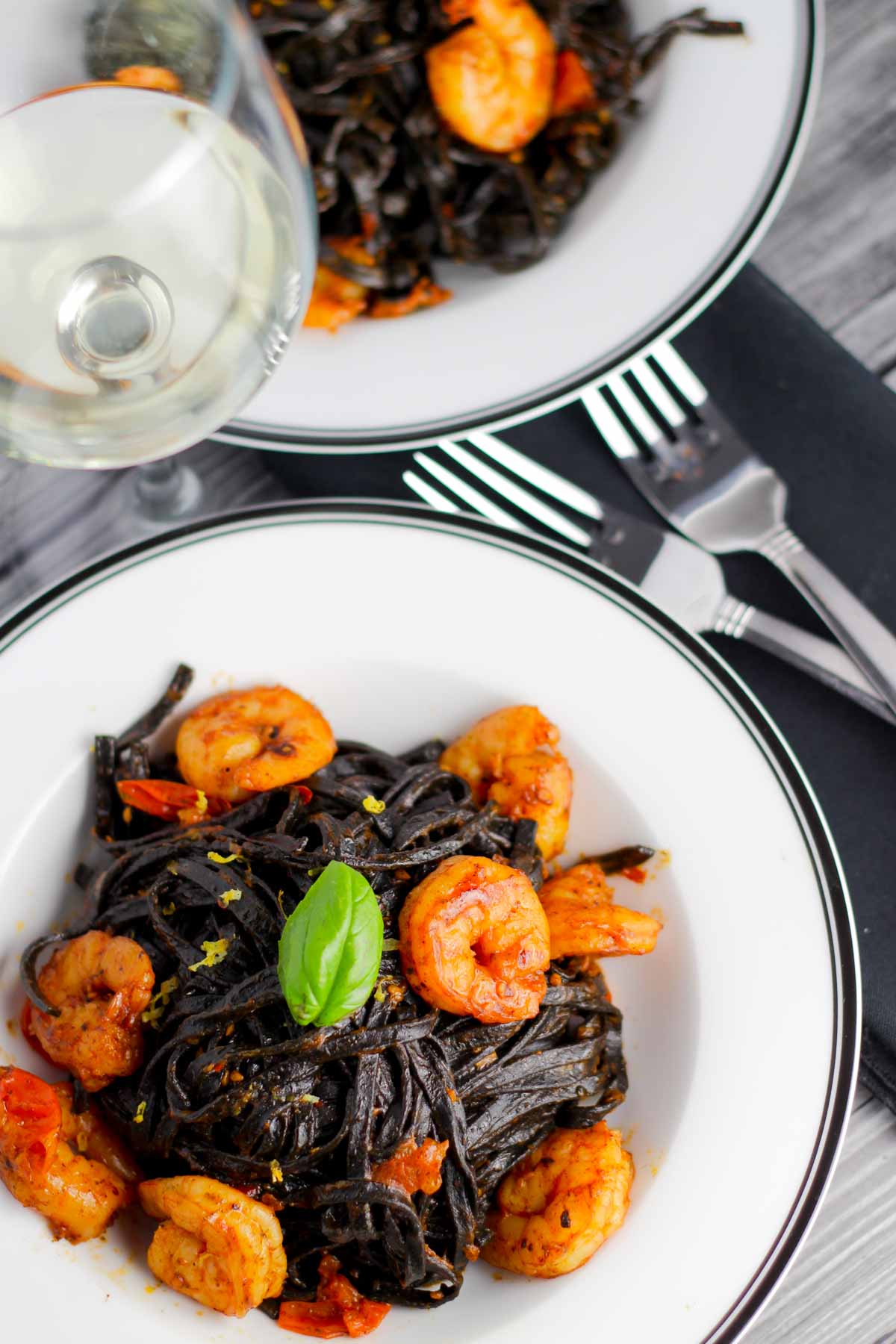 SQUID INK LINGUINI WITH SHRIMP AND CHERRY TOMATOES