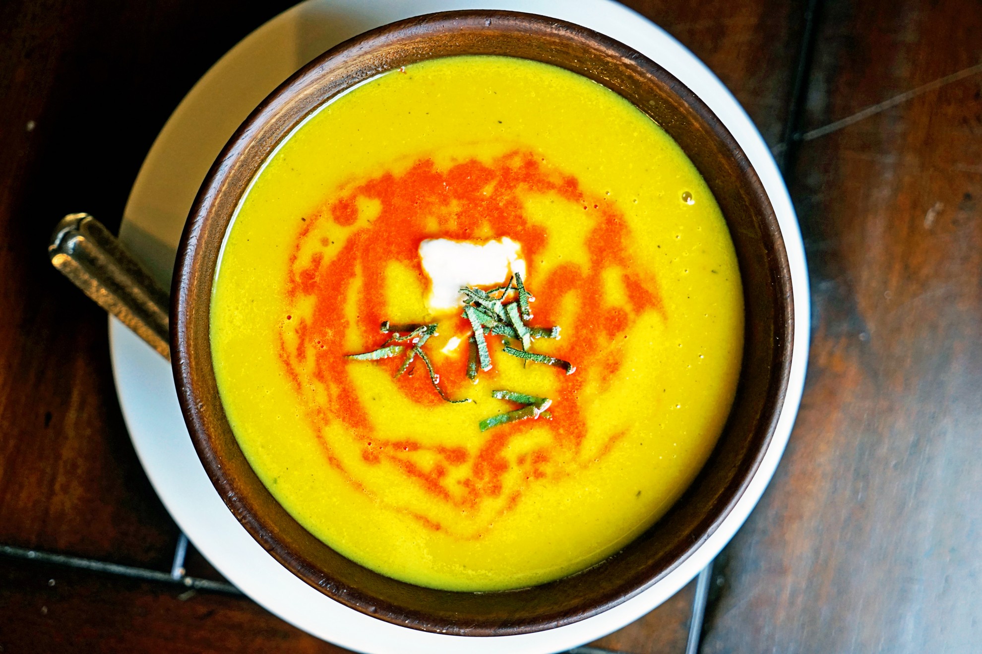 Butternut Squash Soup with Roasted Red Pepper Drizzle and Fried Sage
