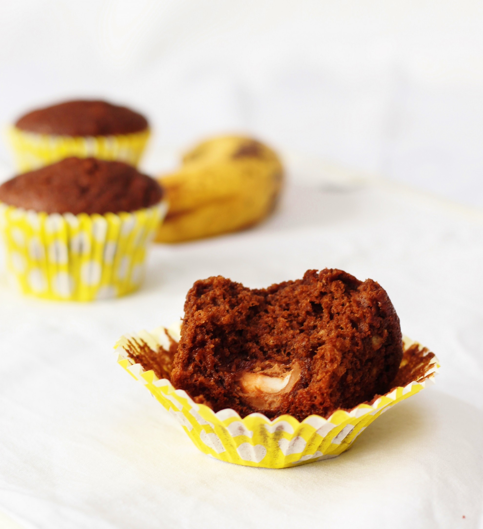 Chocolate and banana muffins with a creme egg surprise