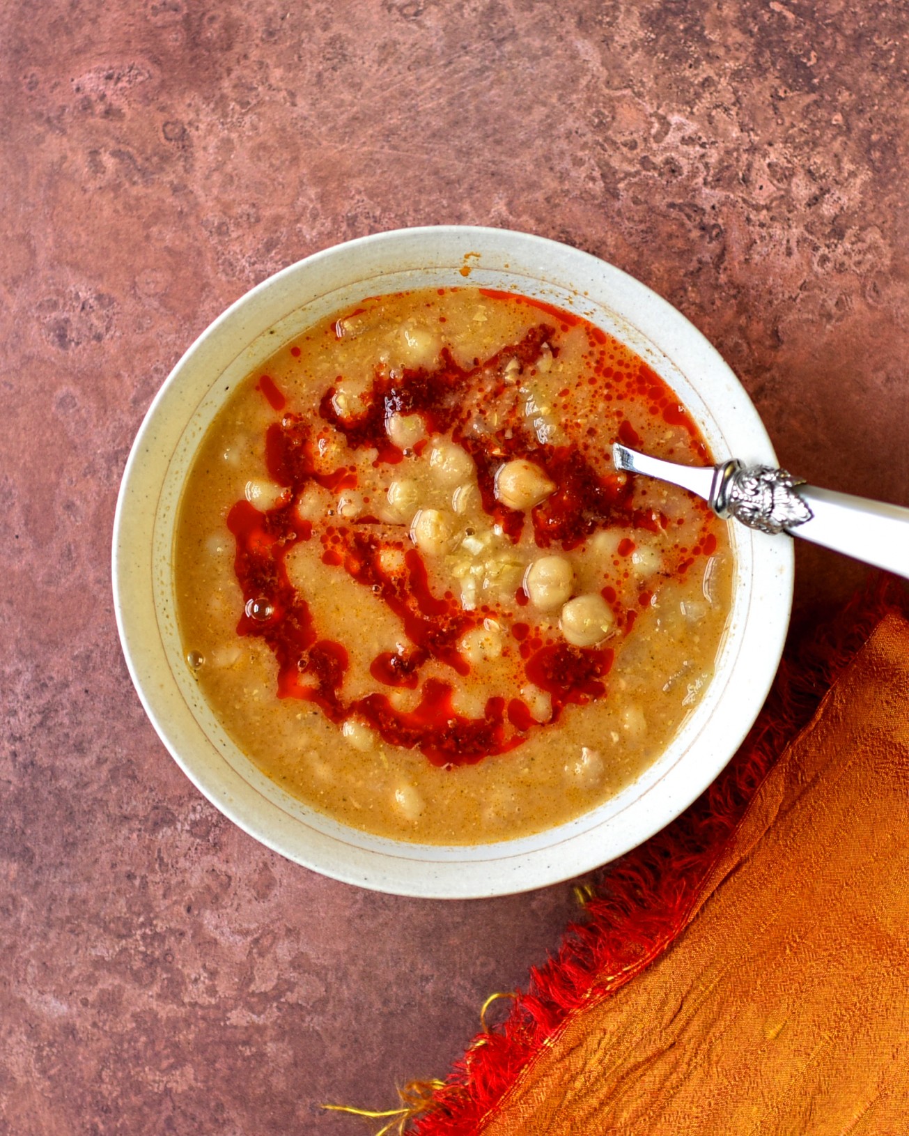Tunisian-style chickpea soup with harissa oil