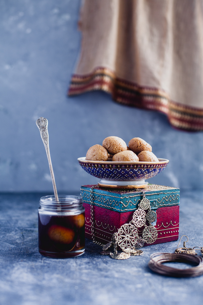 Nolen Gur Rasgulla - Cheese Balls cooked in Jaggery Syrup