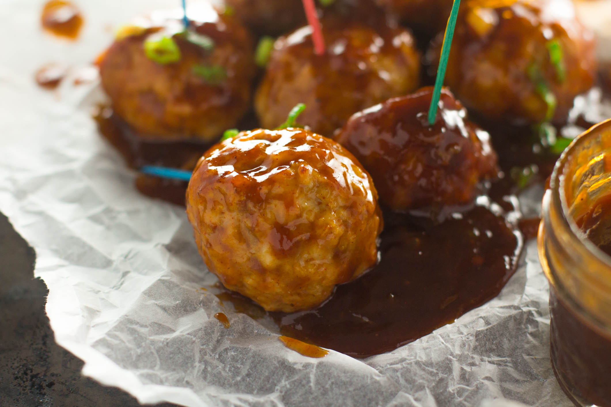 Healthy Chicken Meatballs with a Chipotle Bourbon Glaze - Girl and the Kitchen