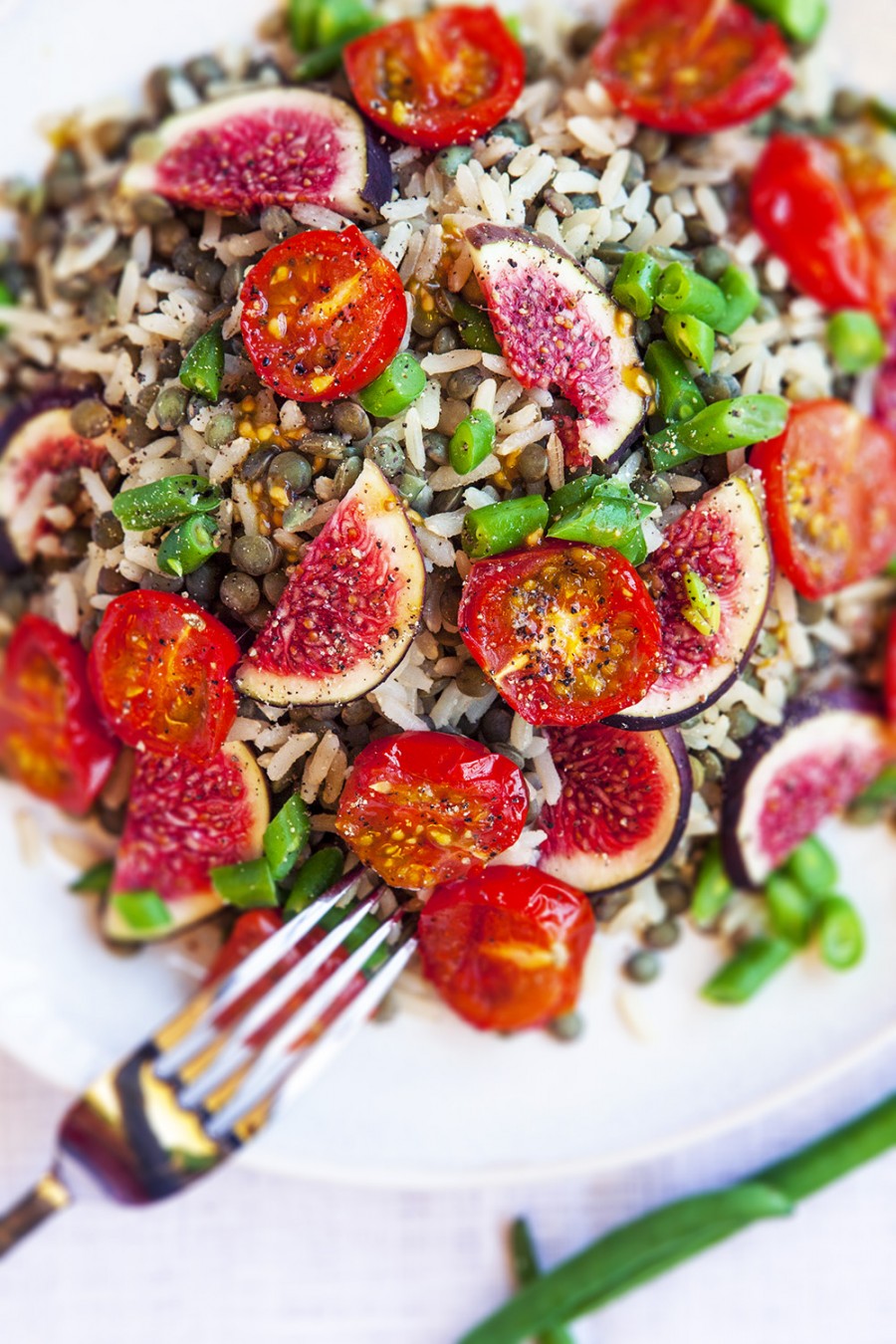 Lentil salad with brown rice and tomatos, rich of vitamin C