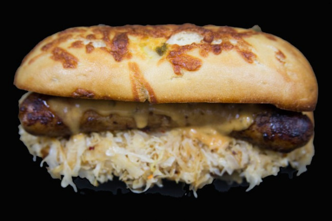 Andouille Sausage and Sauerkraut with 1000 Island Dressing on a Jalapeno-Cheddar Cheese Roll