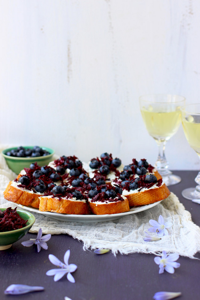 Blueberry Chevre Crostini With Champagne Vinegar Hibiscus Flowers