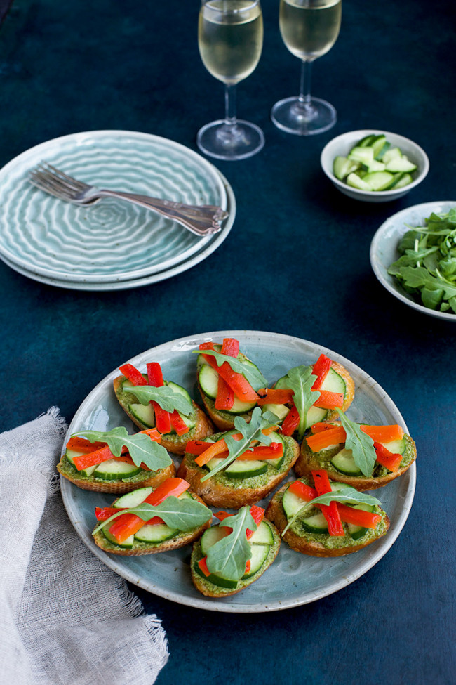 Chive Asiago Pesto Crostini With Roasted Red Pepper Cucumber And Arugula