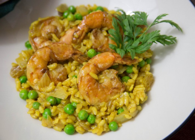 Curry Risotto with Sauteed Prawns Peas and Golden Raisins