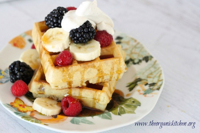 simple buttermilk waffles with berries bananas and maple whipped cream