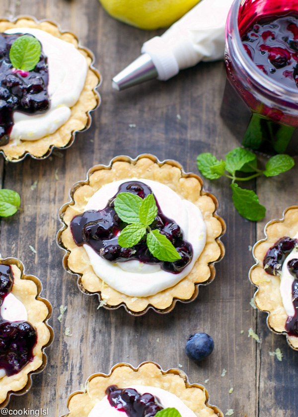 Tartlets With Mascarpone Whipped Cream And Blueberry Sauce