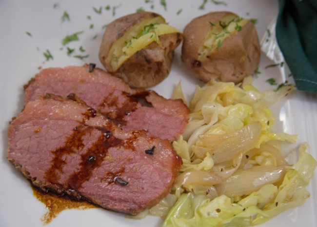 Baked Corned Beef with Sauteed Cabbage and Baked New Potatoes