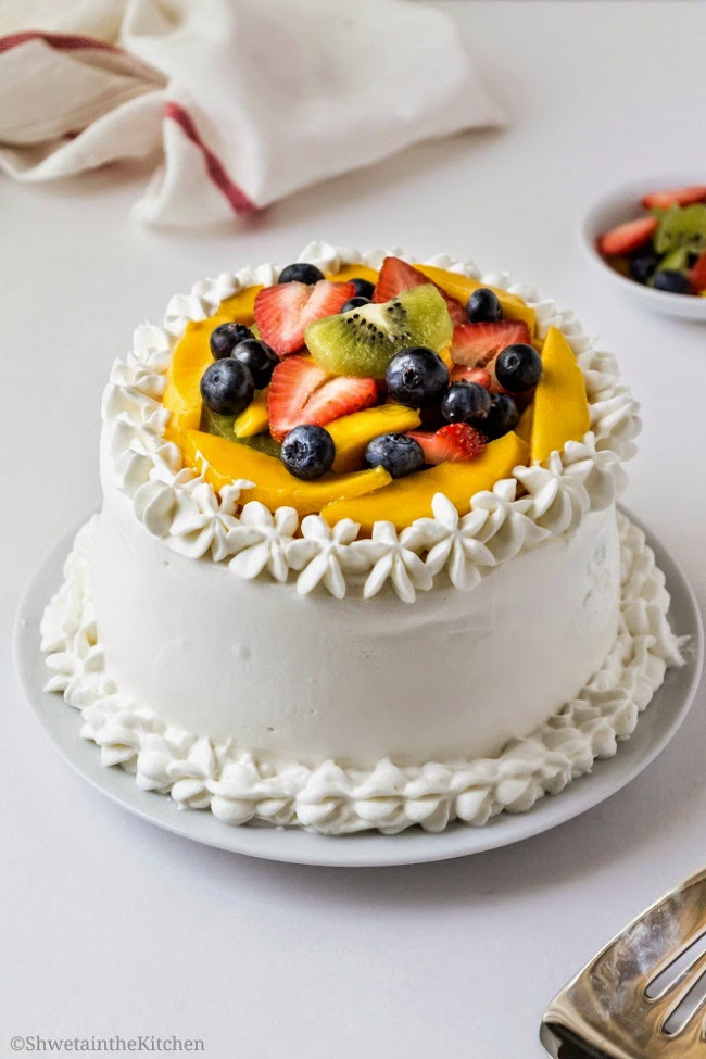 Vanilla Sponge Cake with Whipped Cream Frosting and Fresh Fruits