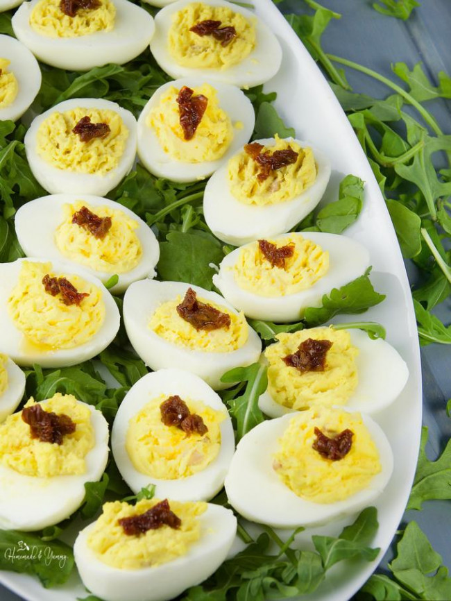 Flavoured Devilled Eggs With Bacon And Tomato
