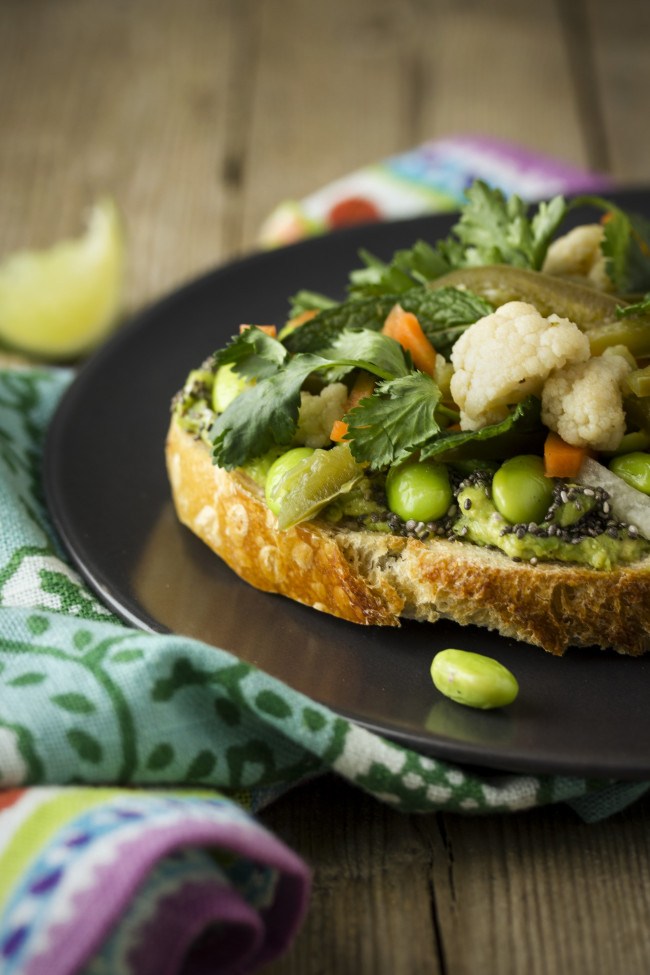kicked-up avocado toast with spicy pickled veggies