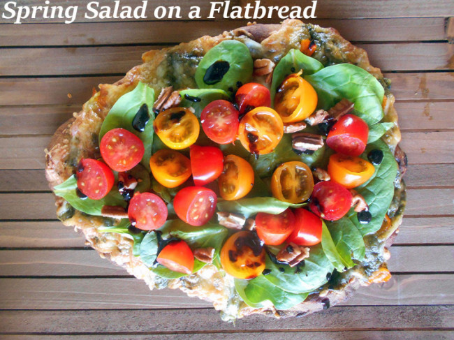 spring salad on flatbread pizza