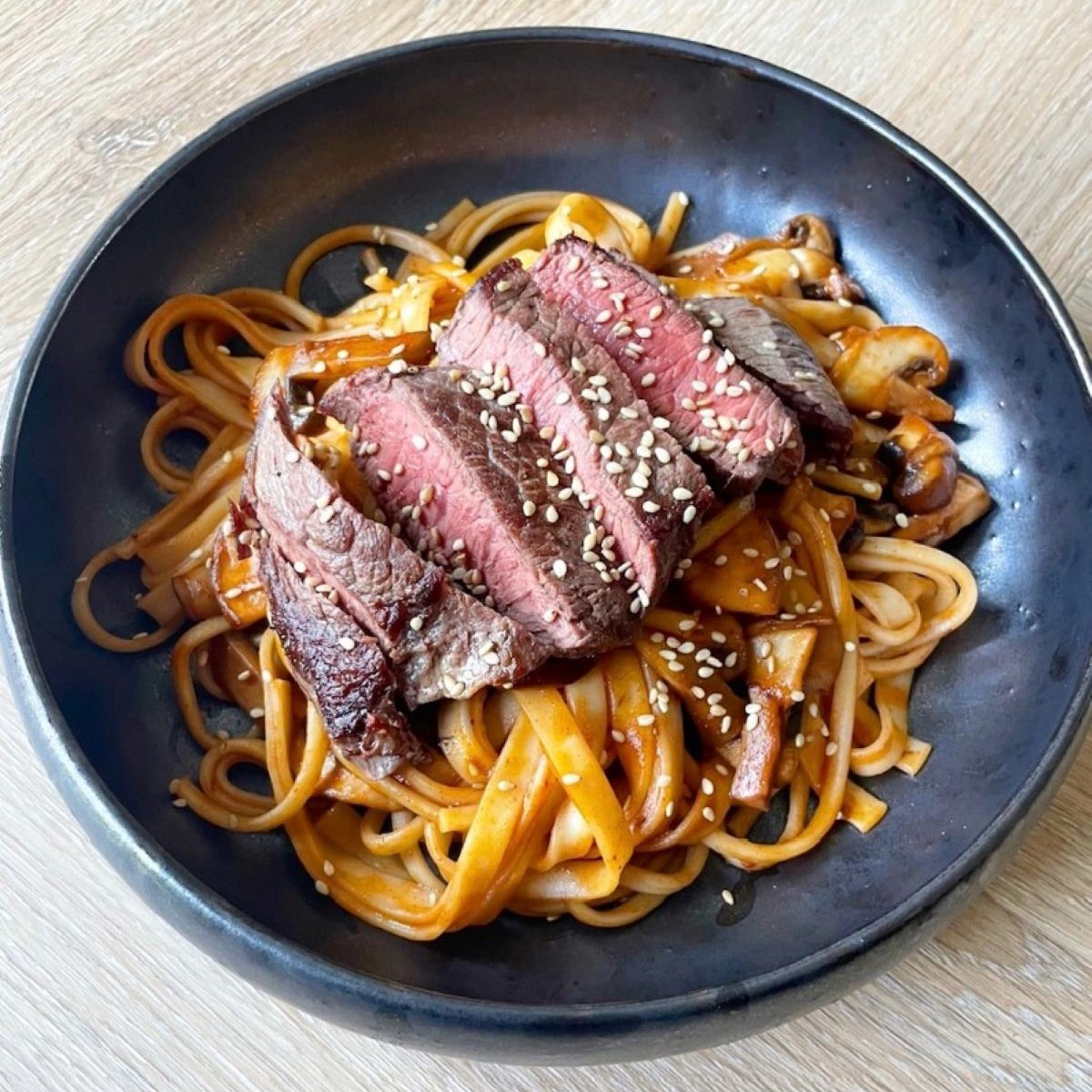 Spicy Udon Noodles with Mushrooms and Beef