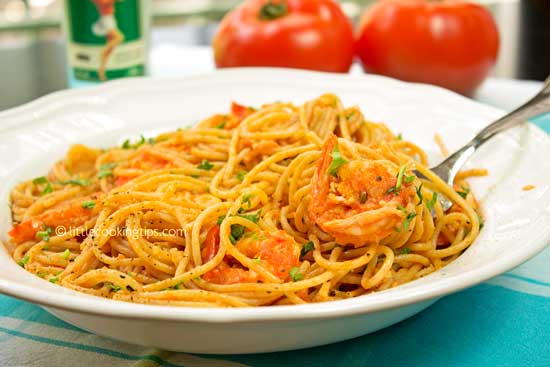 Ouzo flavored shrimp tomato pasta
