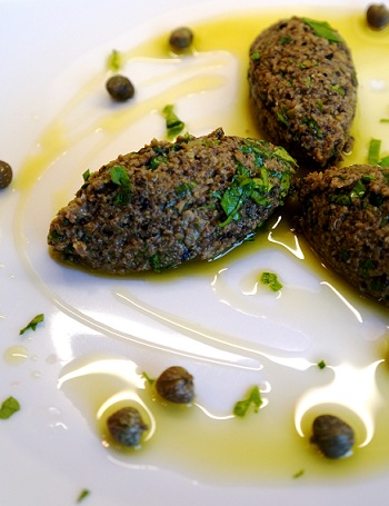 A SULTRY GREEN AND BLACK OLIVE TAPENADE..