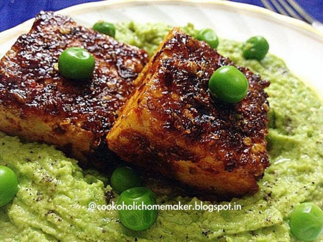 Harissa crusted tofu with green peas hummus