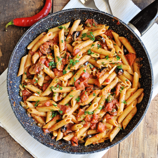 Spicy Penne Pasta with Anchovies Capers and Black Spanish Olives