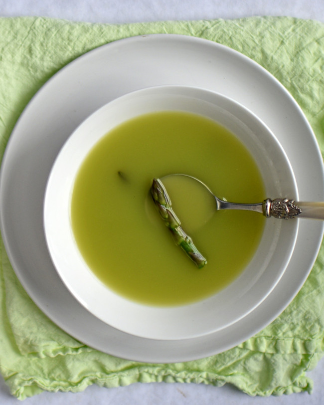 Pea And Rocket Consomme With Asparagus