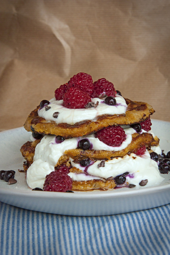 Vegan Pancakes made of Sweet Potato served with Berries.
