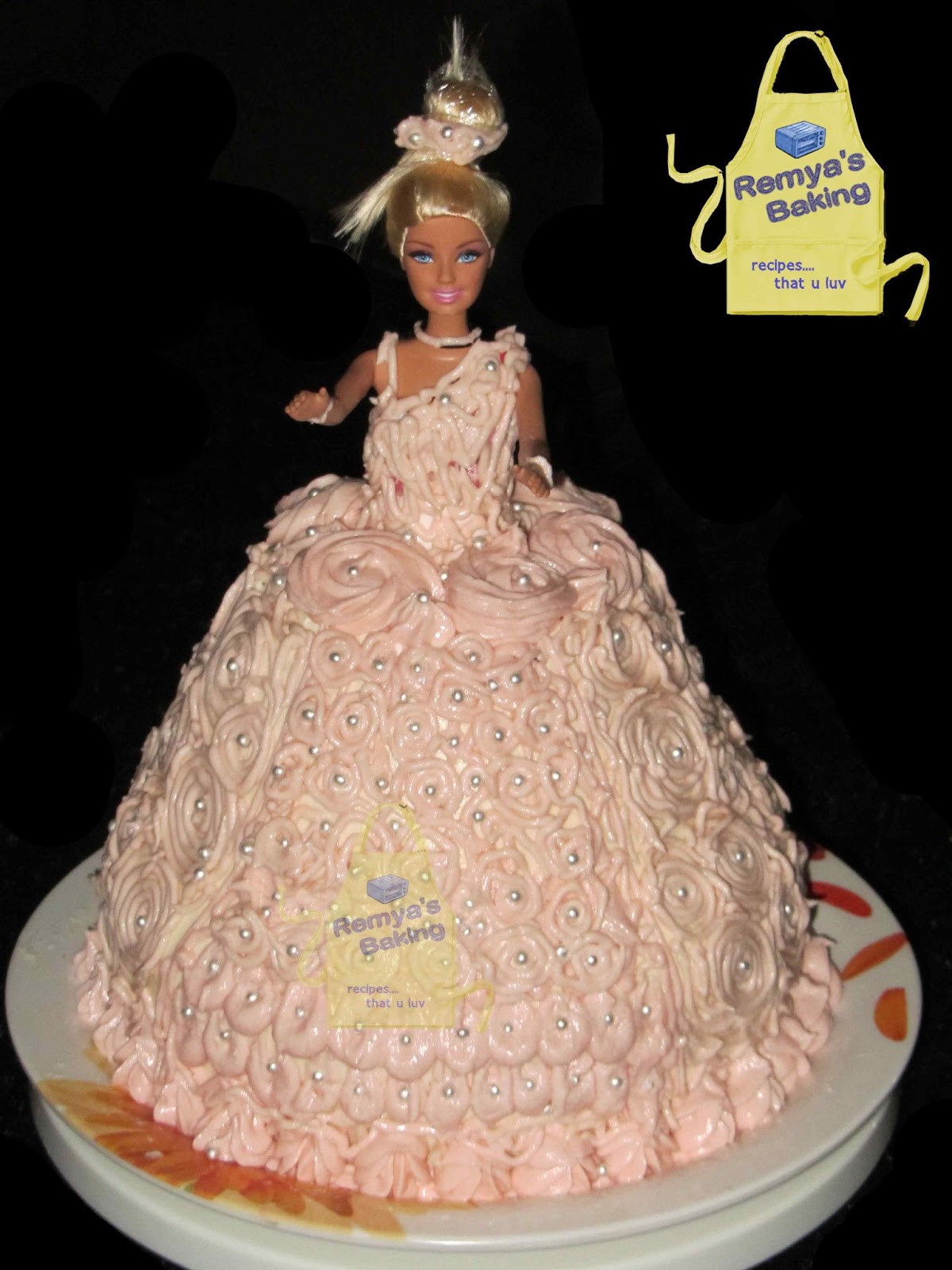 A four layer Barbie doll cake for my little Princess 